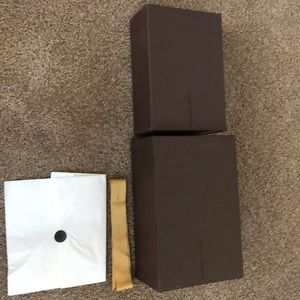 Louis Vuitton boxes ,tissue ,and ribbon